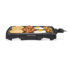 Hamilton Beach electric griddle with breakfast foods on cooking surface