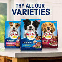Set of three dry dog food bags with dog faces and different flavor labels