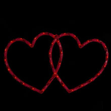 Double heart LED silhouette with glowing red outlines, overlapping hearts