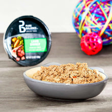 Wet dog food pate in bowl with Pure Balance lamb dinner cup behind