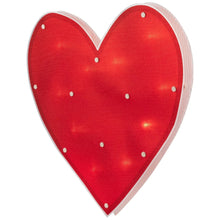 Red heart window silhouette with lit bulb dots shown from a slight angle