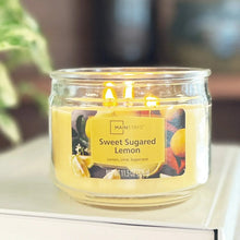 Yellow Sweet Sugared Lemon glass jar candle with three wicks burning