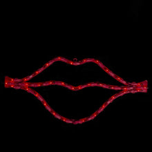 Lighted red lips LED window silhouette, curved lips outline with glowing bulbs
