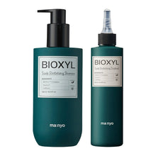 BIOXYL scalp revitalizing shampoo and treatment bottles, teal-green with pumps