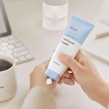 Panthetoin cream tube dispensing a small cream dot, blue cap