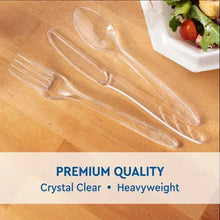 Clear plastic forks and spoons set, three utensils shown