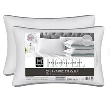 White bed pillows set, rectangular with stitched edges and flat, smooth surface