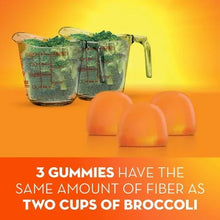 Metamucil Fiber Gummies with orange gummies and measuring pitcher