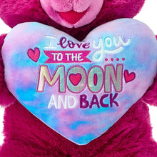 Pink teddy bear plush with heart bib reading 'Love You To The Moon And Back'