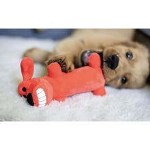 Orange plush dog toy with squeaker, being chewed by a golden puppy