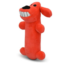 Orange smiling plush dog toy with squeaker, close side view with striped grin