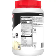 Vanilla whey protein powder tub showing Nutrition Facts panel, red cap and black label