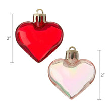 Red heart and iridescent heart ornaments with gold hanging caps