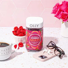 OLLY women’s multivitamin gummy bottle with berry-themed branding and colorful label design.