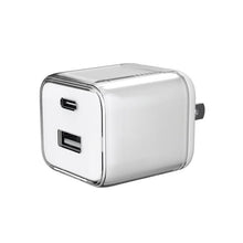 White dual-port USB-C/USB wall charger with foldable plug, showing two charging ports