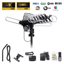 Motorized outdoor TV antenna with multi-element UHF array and mounting pole, plus cables and adapter