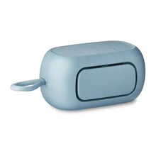 Blue small rugged Bluetooth speaker with front passive radiator grille and side wrist strap