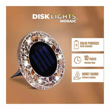 Tan mosaic solar disk light with dark solar panel and pointed stake