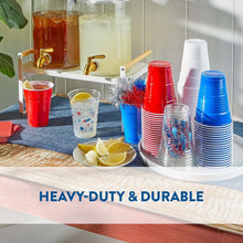 Stack of patriotic plastic cups in red, blue, white, and silver tones