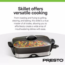 Electric nonstick skillet with tempered glass lid, cooking contents inside