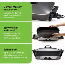 Electric skillet with fold-down handles and tempered glass lid, ready to lift