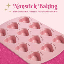 Pink mini heart baking pan with 12 nonstick heart cavities, close-up