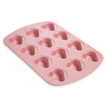 Pink mini heart baking pan with 12 heart-shaped cavities