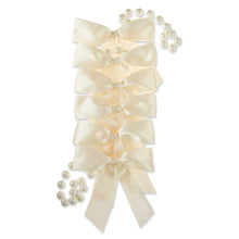 Cream beaded garland with pearl beads and satin bow clusters