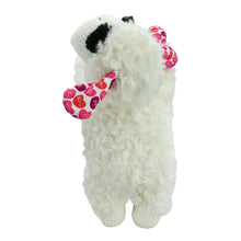 White plush lamb dog toy standing with red heart bow and black ear accents