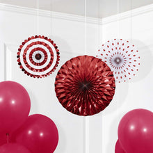 Hanging paper fans: red metallic center, striped, and white polka-dot