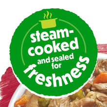 Steam-cooked and sealed for freshness over beef stew wet dog food
