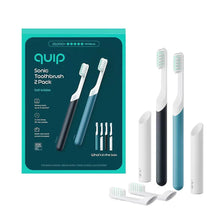 quip Sonic electric toothbrush set with marine and charcoal handles and replacement brush heads