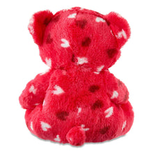 Red plush bear with white heart polka-dot pattern, seated back view