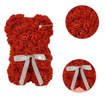 Red artificial rose bear with white ribbon bow, side and close-up views