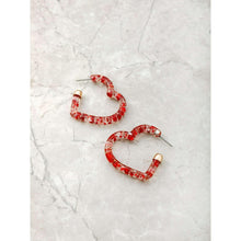 Pair of red glitter open-heart hoop earrings with gold-tone posts