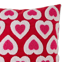 Red heart-pattern decorative pillow close-up with white scalloped plush appliques