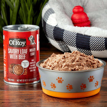 Ol' Roy savory loaf with beef wet dog food can with portion in a bowl