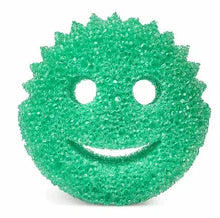 Scrub Daddy green smile-face sponge with two circular eye cutouts