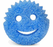 Scrub Daddy blue smile-face sponge with two circular eye cutouts