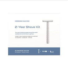 Shave kit packaging showing aluminum razor and stand, 100 blades