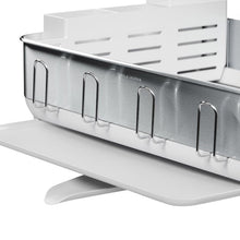 Stainless steel dish rack with utensil slots and simplehuman logo