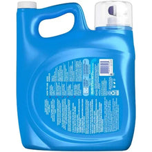 Blue liquid fabric softener bottle with label side facing up