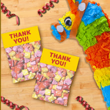 Assorted wrapped Starburst chewy candies with thank-you labels on top
