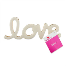 Cream Love tabletop decoration with gold-tone accents and hanging price tag