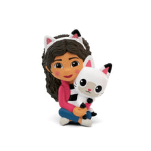 Cartoon girl audio figurine holding a white cat plush, wearing a pink outfit
