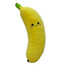 Yellow jumbo banana plush with green stem and cute embroidered face, side view