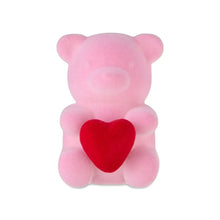 Pink flocked bear tabletop decoration with a red heart