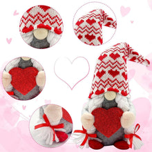 Plush gnome pair: red heart badge on gray body, striped knit hat and red knit hat