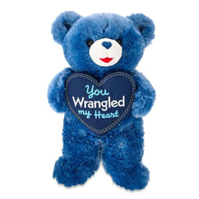 Blue teddy bear plush with navy heart patch, “You Wrangled my Heart”