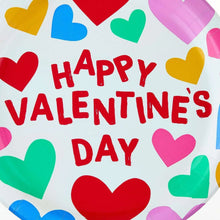 Close-up of disposable paper plate showing Happy Valentine's Day lettering and multicolor hearts